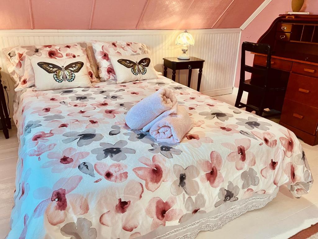 Postel nebo postele na pokoji v ubytování Bed & café Petit Papillon