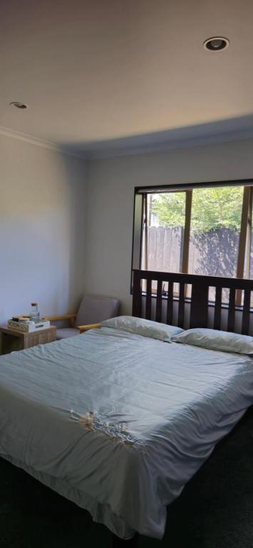 Postel nebo postele na pokoji v ubytování Favona Airport Accomodation