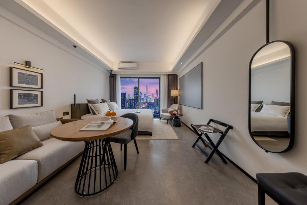 Posezení v ubytování 枫雨酒店公寓华强北店-Fengyu Hotel Apartment Shenzhen Huaqiang North Subway Station Branch