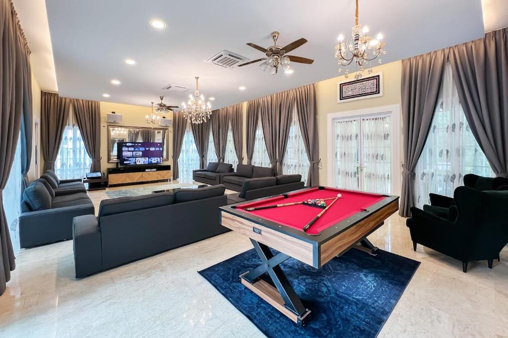 a living room with a pool table in it at Luxury Villa Monterez Club Golf, Shah Alam - Smarthome in Shah Alam