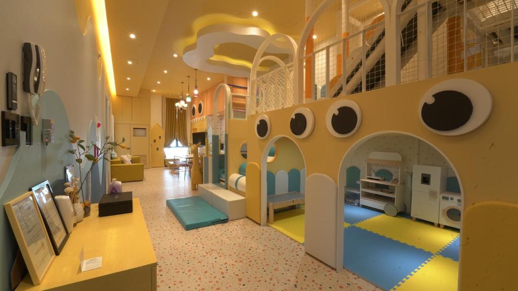 Posezení v ubytování Almond Kids Poolvilla Nampo