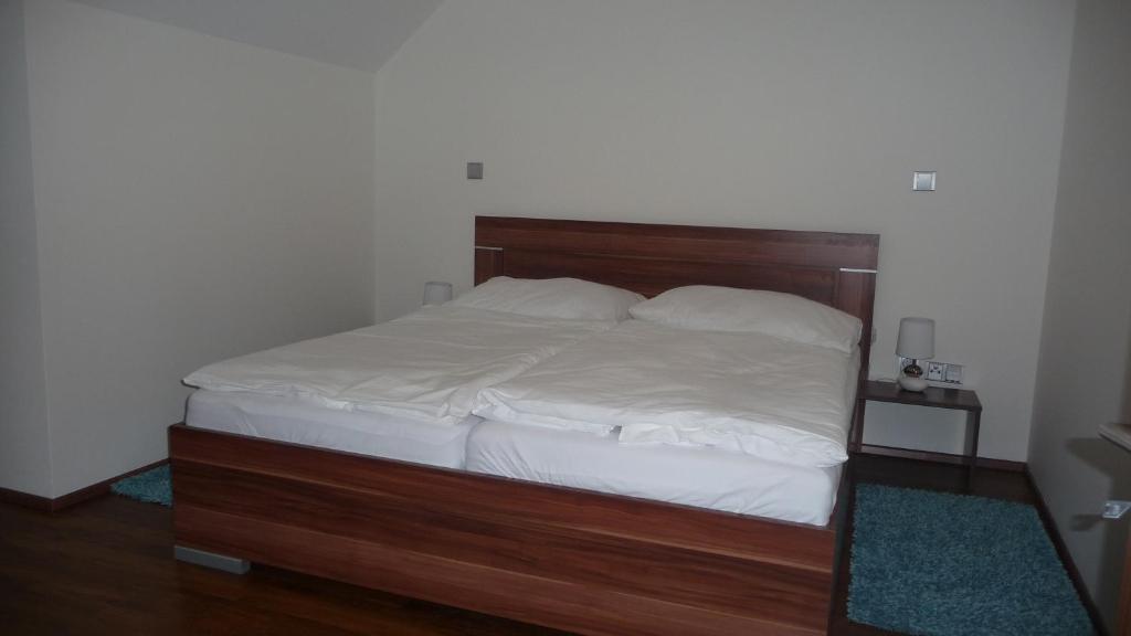 Postel nebo postele na pokoji v ubytování Graphic Hotel