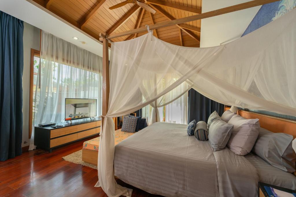 Postel nebo postele na pokoji v ubytování Krabi Resort