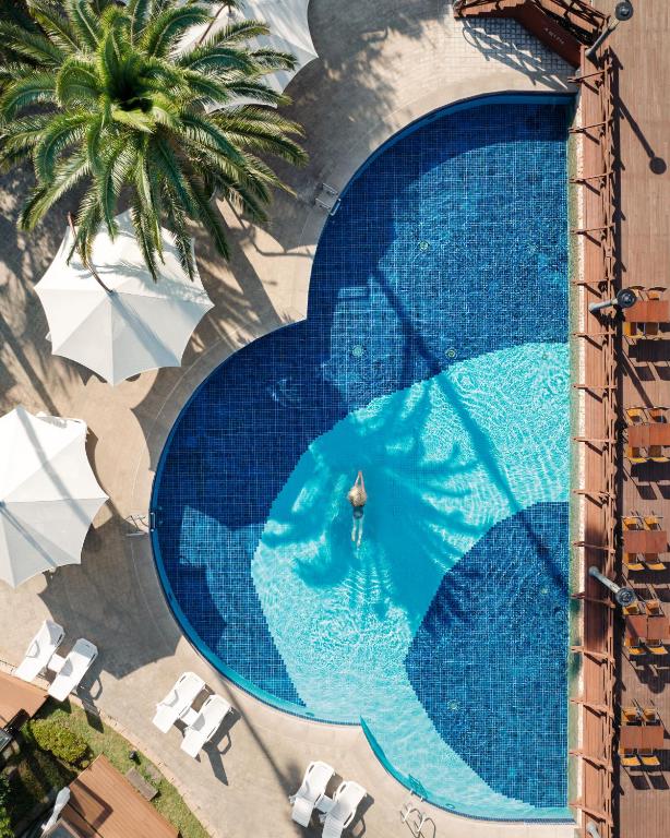 Bazén v ubytování The Suites Hotel Jeju nebo v jeho okolí