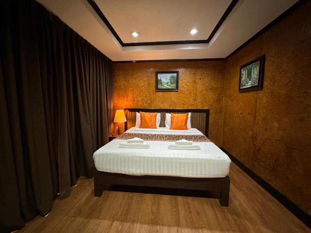 Postel nebo postele na pokoji v ubytování So View Phuket Resort