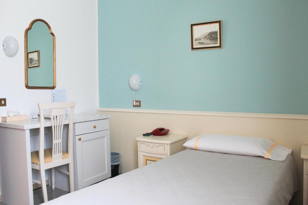 Een bed of bedden in een kamer bij Hotel Sole