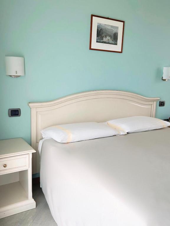 Een bed of bedden in een kamer bij Hotel Sole