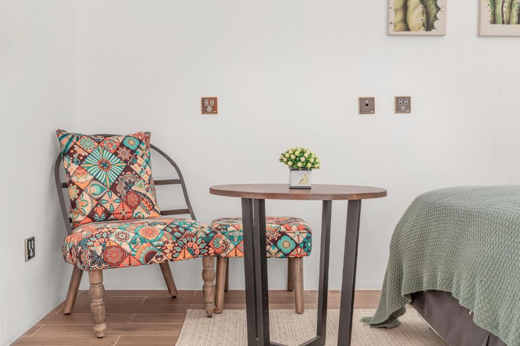 Postel nebo postele na pokoji v ubytování Kenting Fu Bao Inn
