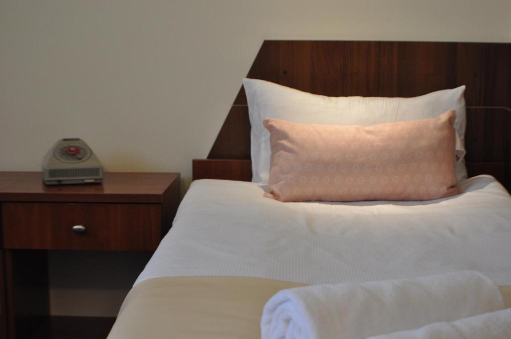 Postel nebo postele na pokoji v ubytování Hotel TIREST