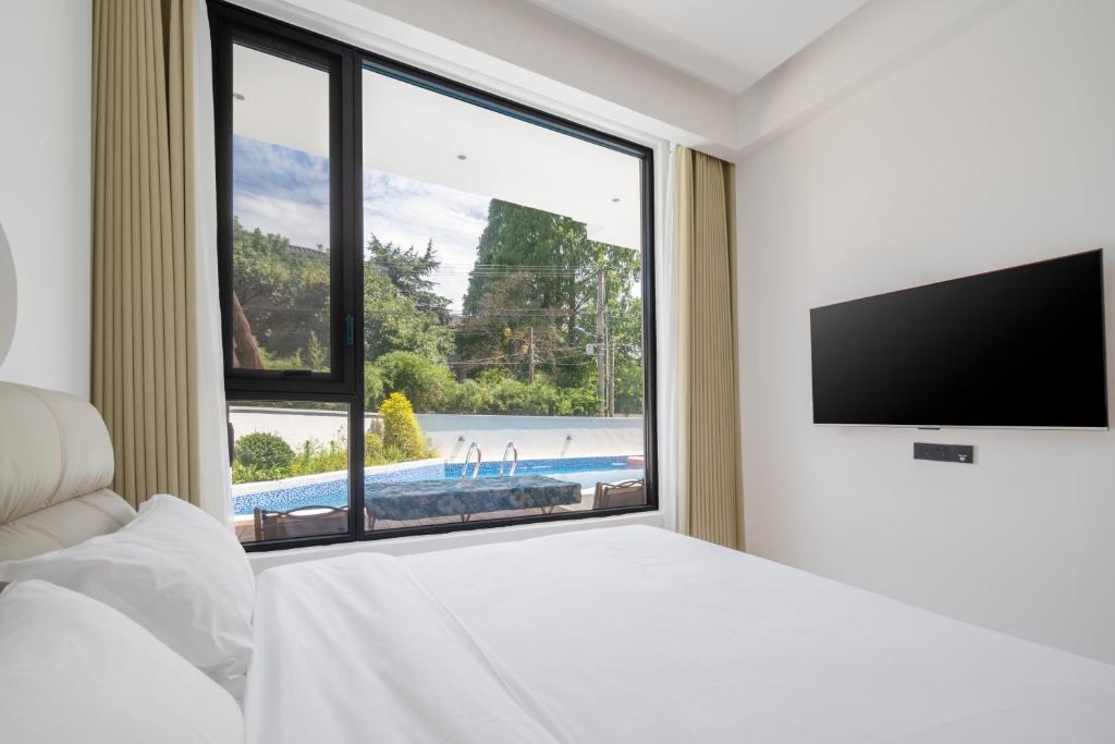BaishuiwanRomantic July in the Wild Sky Garden Private Bath Starry Sky Swimming Pool Wild Luxury Viewing B&B的相册照片