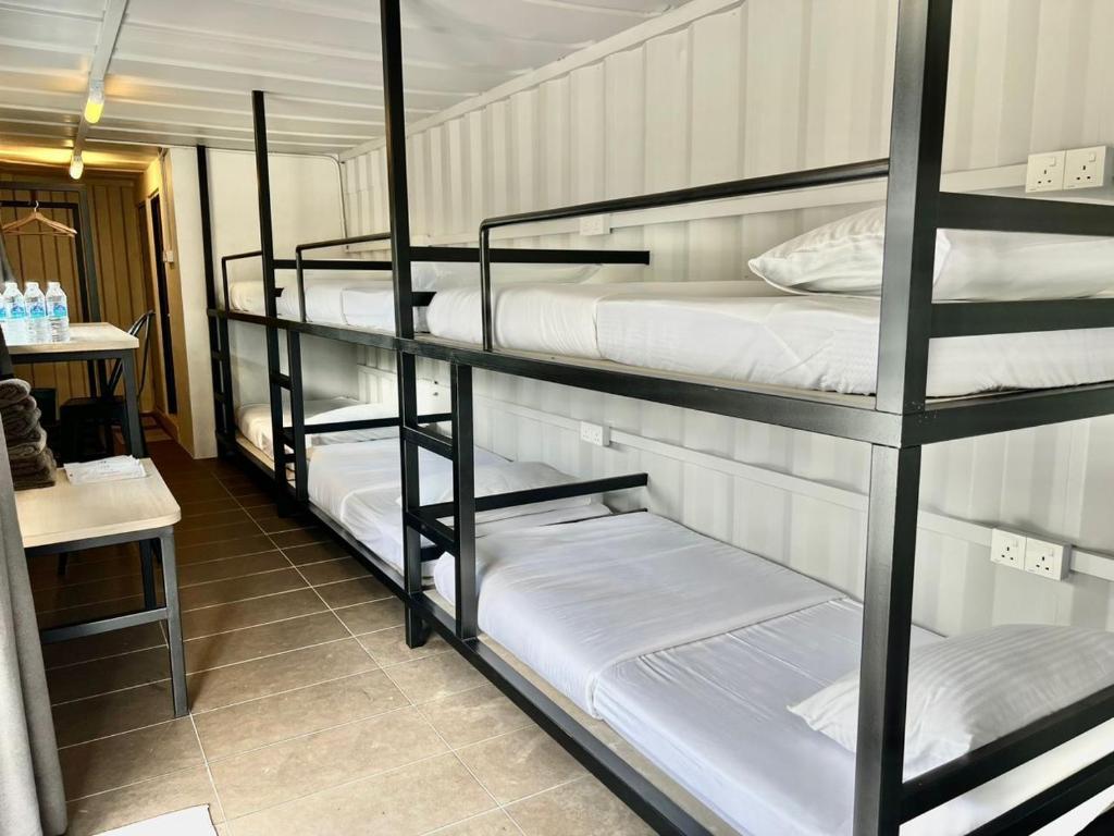 Postel nebo postele na pokoji v ubytování The Cozytainer