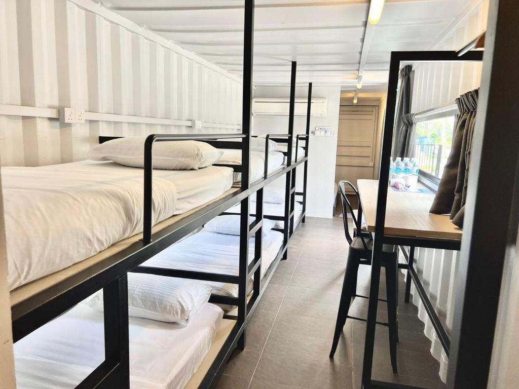 Postel nebo postele na pokoji v ubytování The Cozytainer