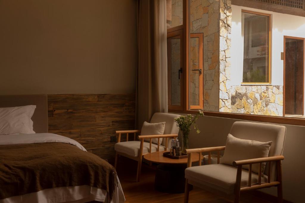 Postel nebo postele na pokoji v ubytování One Zen Lodge Snowy Haven