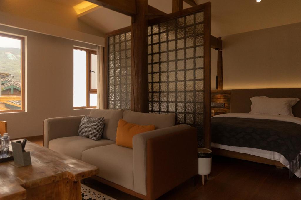 Postel nebo postele na pokoji v ubytování One Zen Lodge Snowy Haven