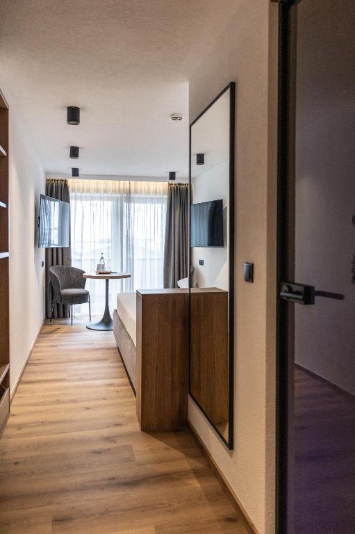 TV a/nebo společenská místnost v ubytování Hotel Lamtana