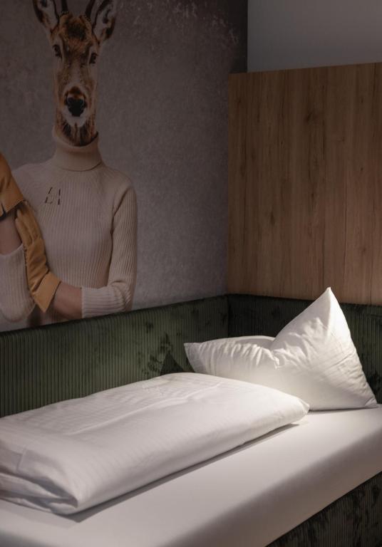 Postel nebo postele na pokoji v ubytování Hotel Lamtana