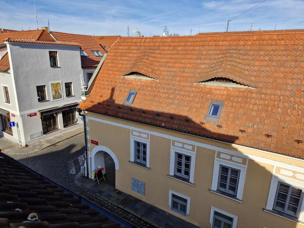 an overhead view of a building with a red roof at Pension U Tří sedláků in České Budějovice