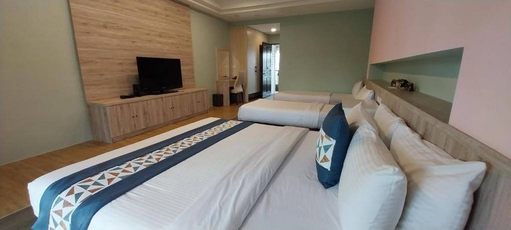 Postel nebo postele na pokoji v ubytování Coconutpalm Home