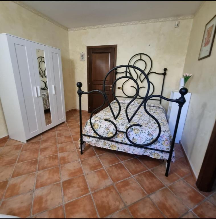 Postel nebo postele na pokoji v ubytování Dimora D'Offizi