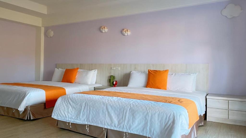 Postel nebo postele na pokoji v ubytování Coconutpalm Home
