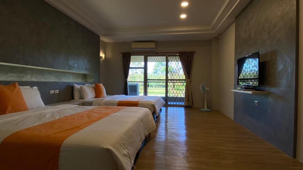 Postel nebo postele na pokoji v ubytování Coconutpalm Home