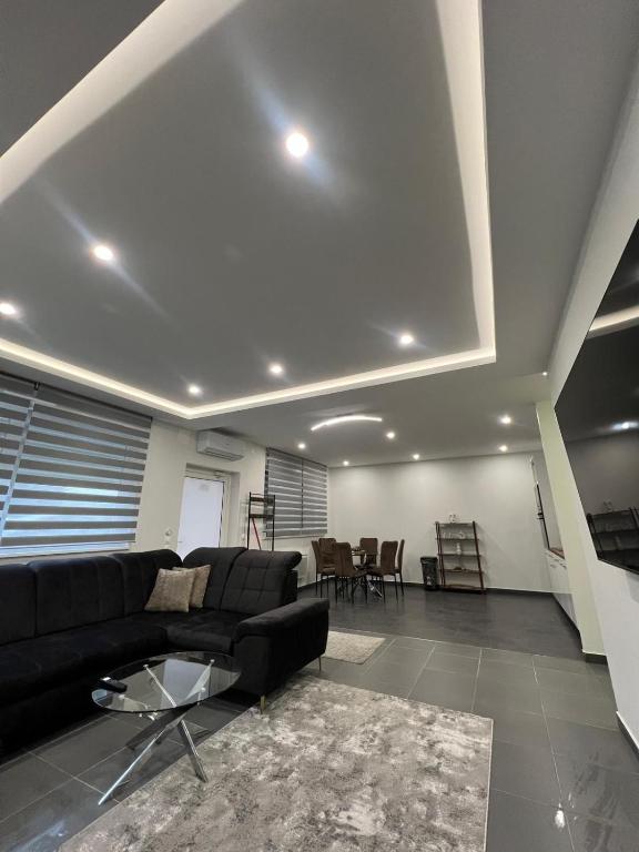 Posezení v ubytování Spacious and modern loft with Balneo space