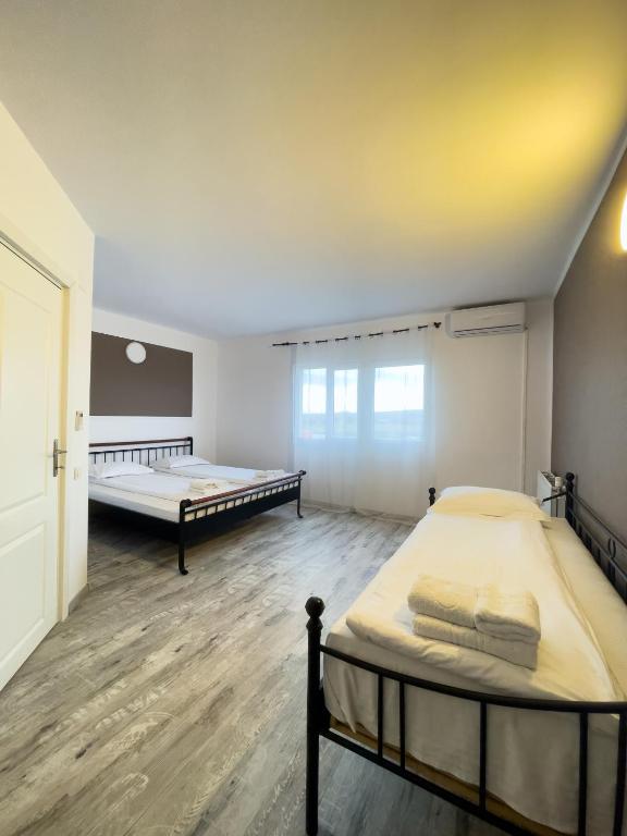 Postel nebo postele na pokoji v ubytování Myda