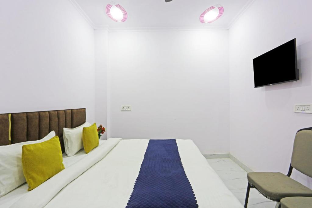 TV a/nebo společenská místnost v ubytování Twamev Residency