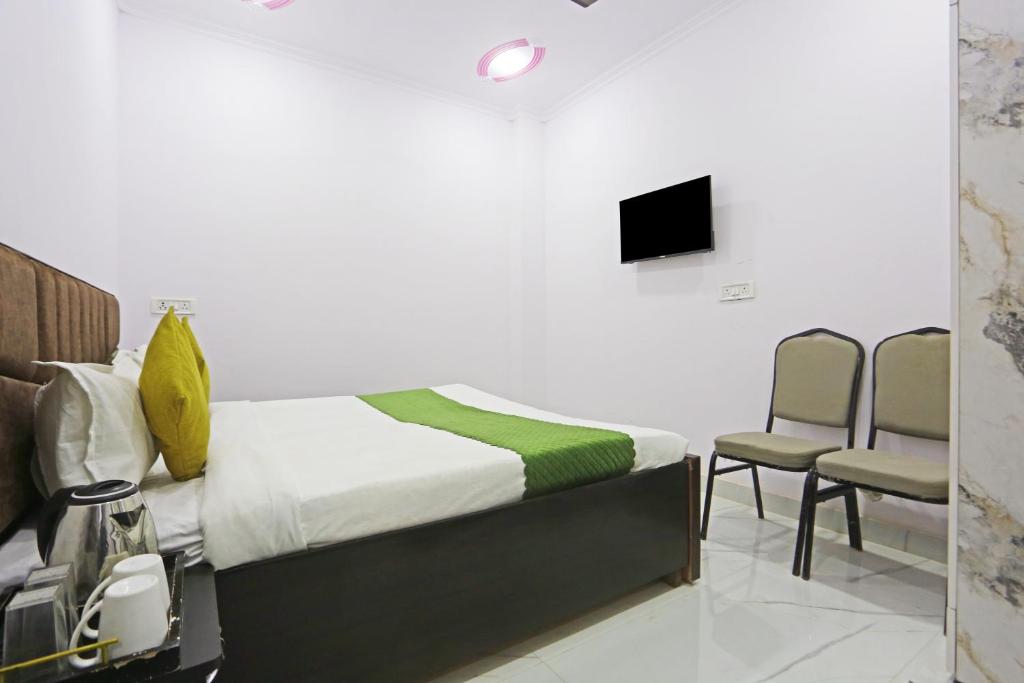 TV a/nebo společenská místnost v ubytování Twamev Residency