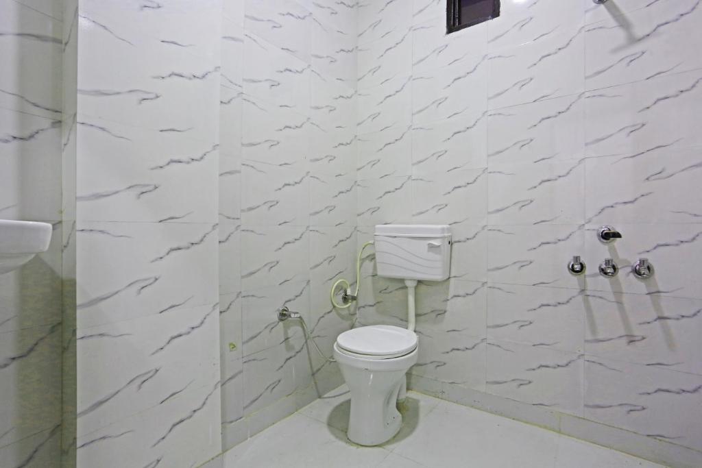 Koupelna v ubytování Twamev Residency