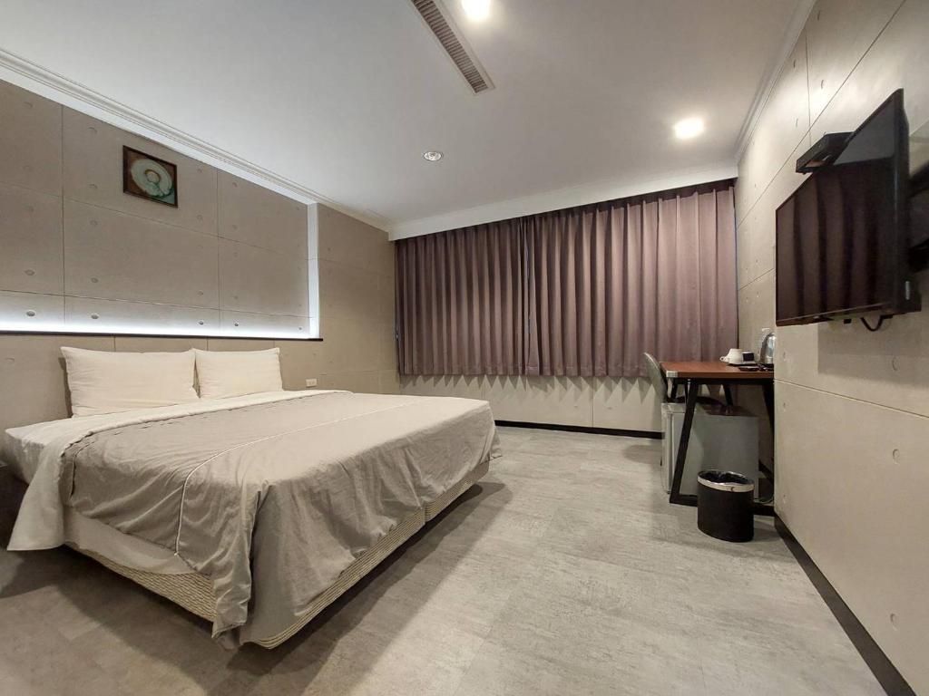 TV a/nebo společenská místnost v ubytování Hwa Nan Hotel