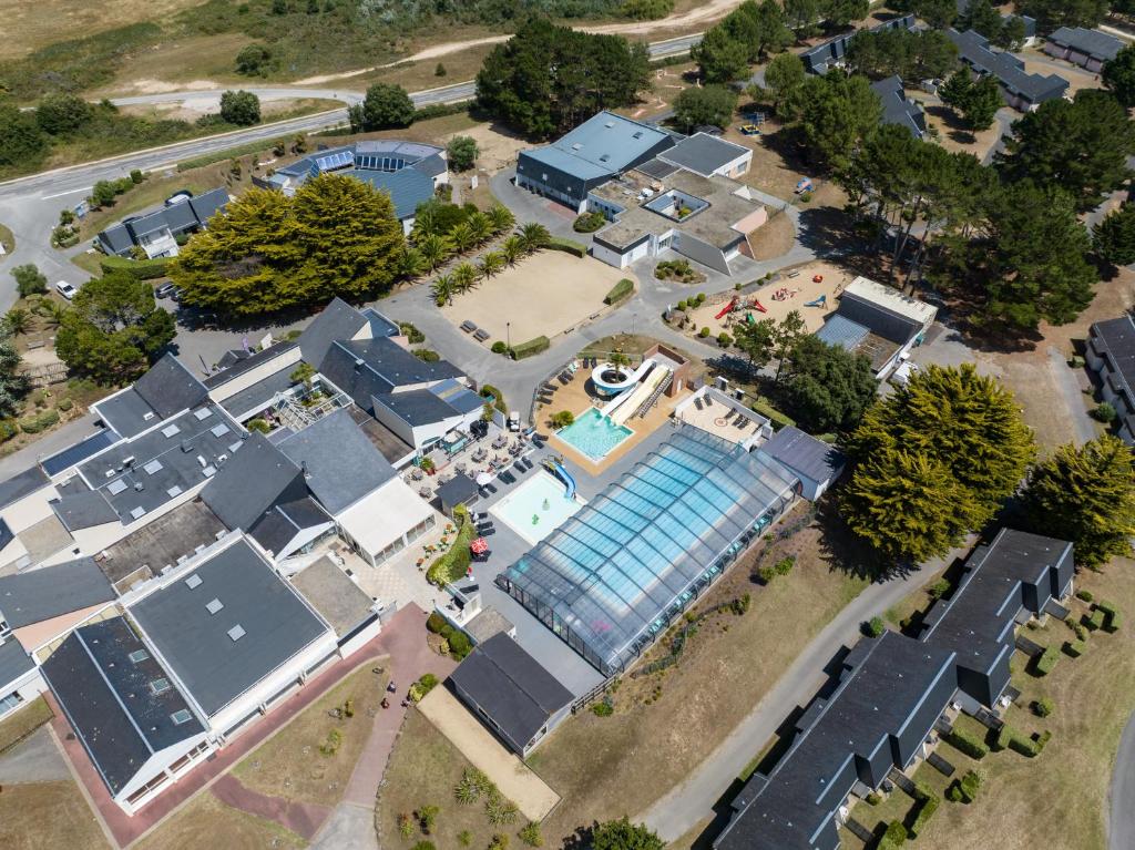 an overhead view of a house with a pool at Vacances Bleues Club Keravel in Carnac