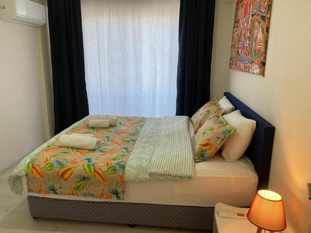 Postel nebo postele na pokoji v ubytování Dalaman Pansiyon & Family rooms