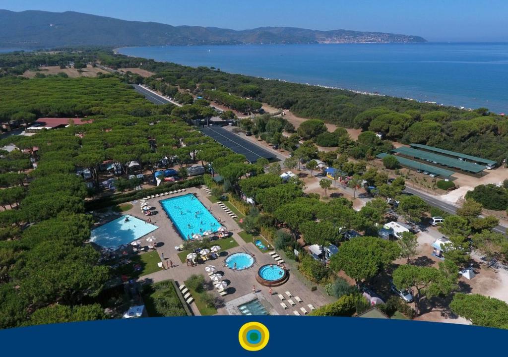 an aerial view of a resort with a swimming pool at Club del Sole Orbetello Family Collection in Orbetello