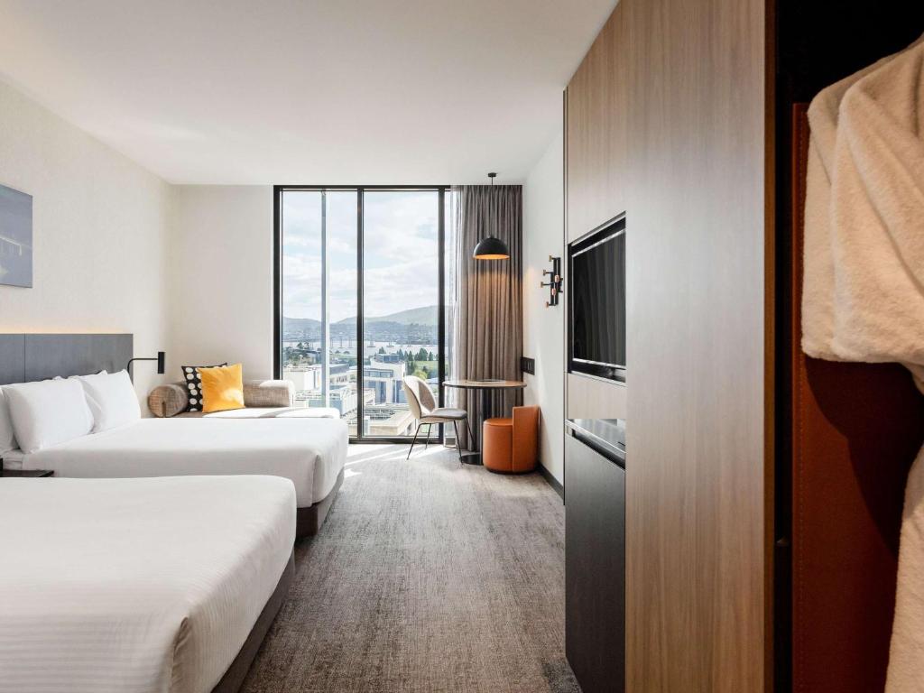 Postel nebo postele na pokoji v ubytování Mövenpick Hotel Hobart