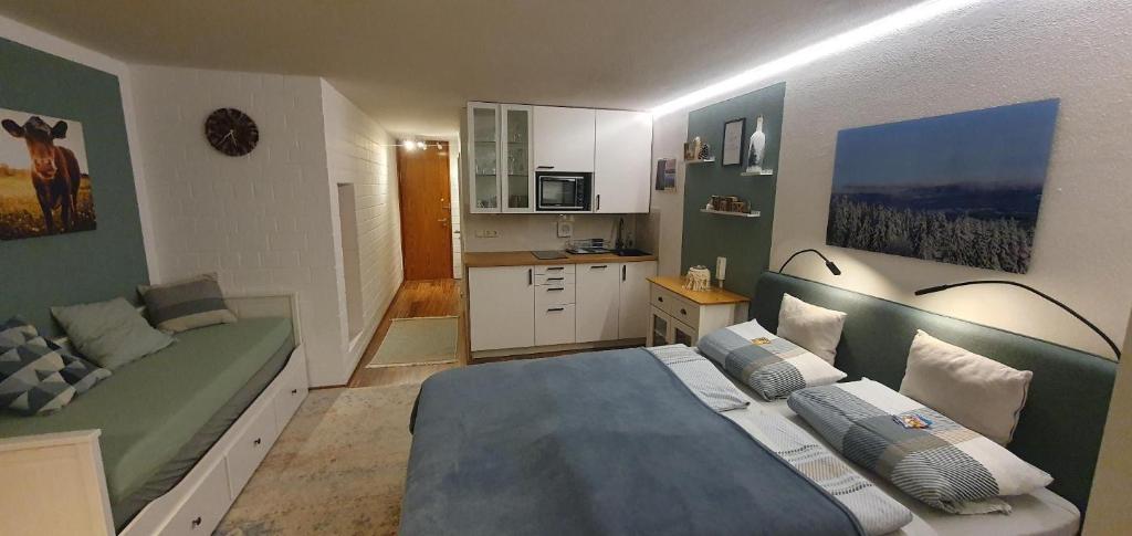Kuchyň nebo kuchyňský kout v ubytování Appartement Honey