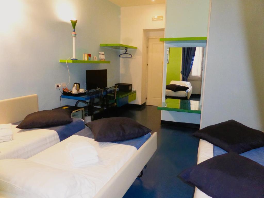 Televízia a/alebo spoločenská miestnosť v ubytovaní Correra 241 Lifestyle Hotel