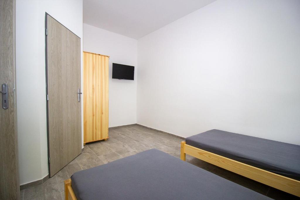 Postel nebo postele na pokoji v ubytování Ubytování AMZ