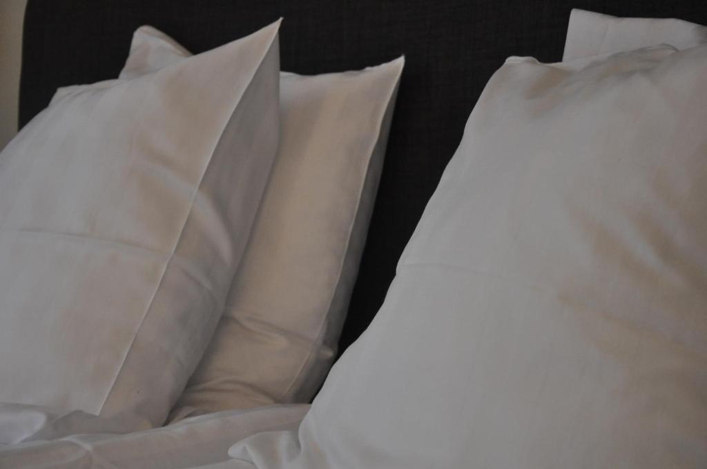 Postel nebo postele na pokoji v ubytování Home Hotel Norre Park