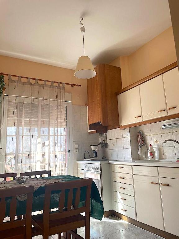 Kuchyň nebo kuchyňský kout v ubytování Friendly Family House