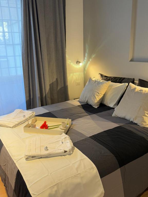 Una cama o camas en una habitación de Guest House VB Luxury Suites