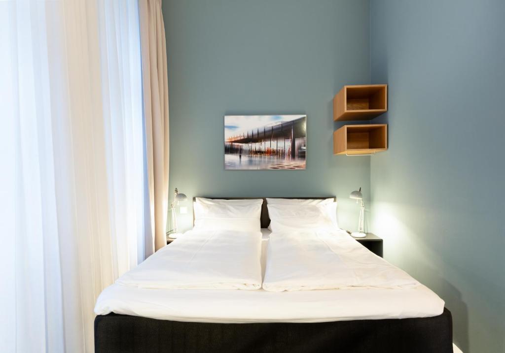 Postel nebo postele na pokoji v ubytování Hotel Johann