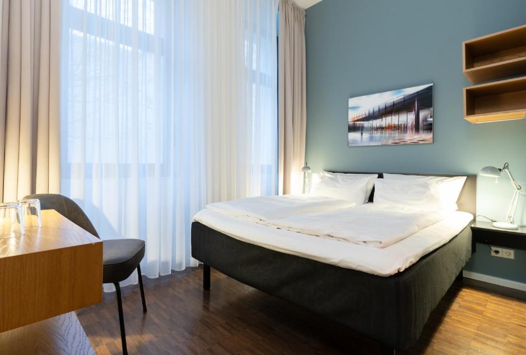 Postel nebo postele na pokoji v ubytování Hotel Johann
