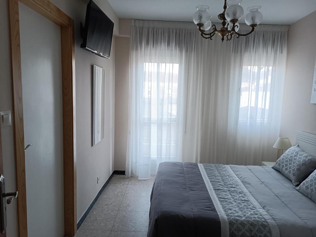 Posteľ alebo postele v izbe v ubytovaní Albergue Agarimo