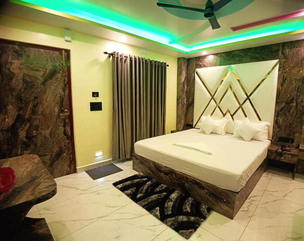 Postel nebo postele na pokoji v ubytování Hotel Maniraj Inn