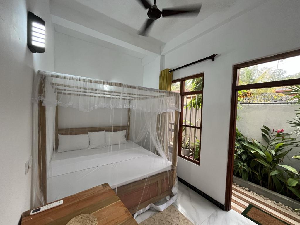 Postel nebo postele na pokoji v ubytování ASAA House - Private Rooms