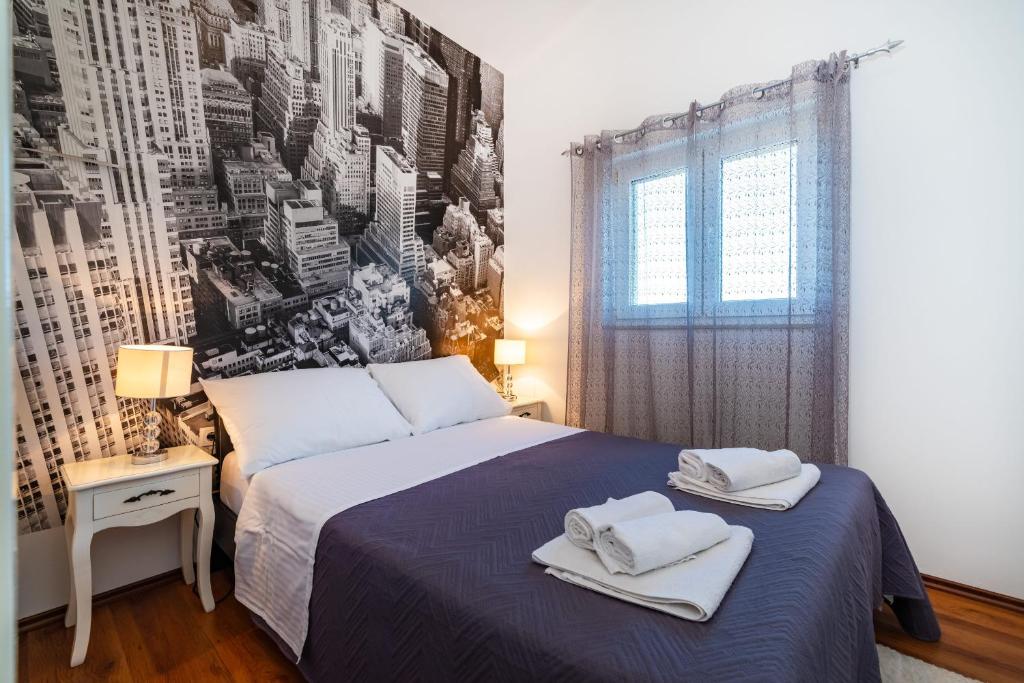 Łóżko lub łóżka w pokoju w obiekcie Villa Didov dvor ZadarVillas