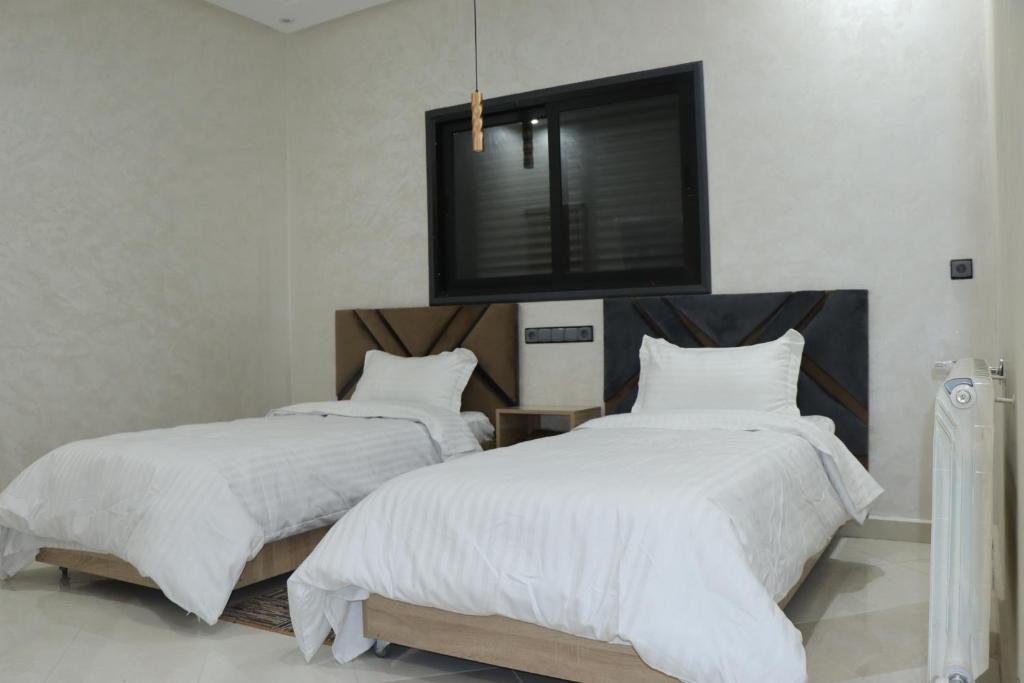 Postel nebo postele na pokoji v ubytování VANA hôtel