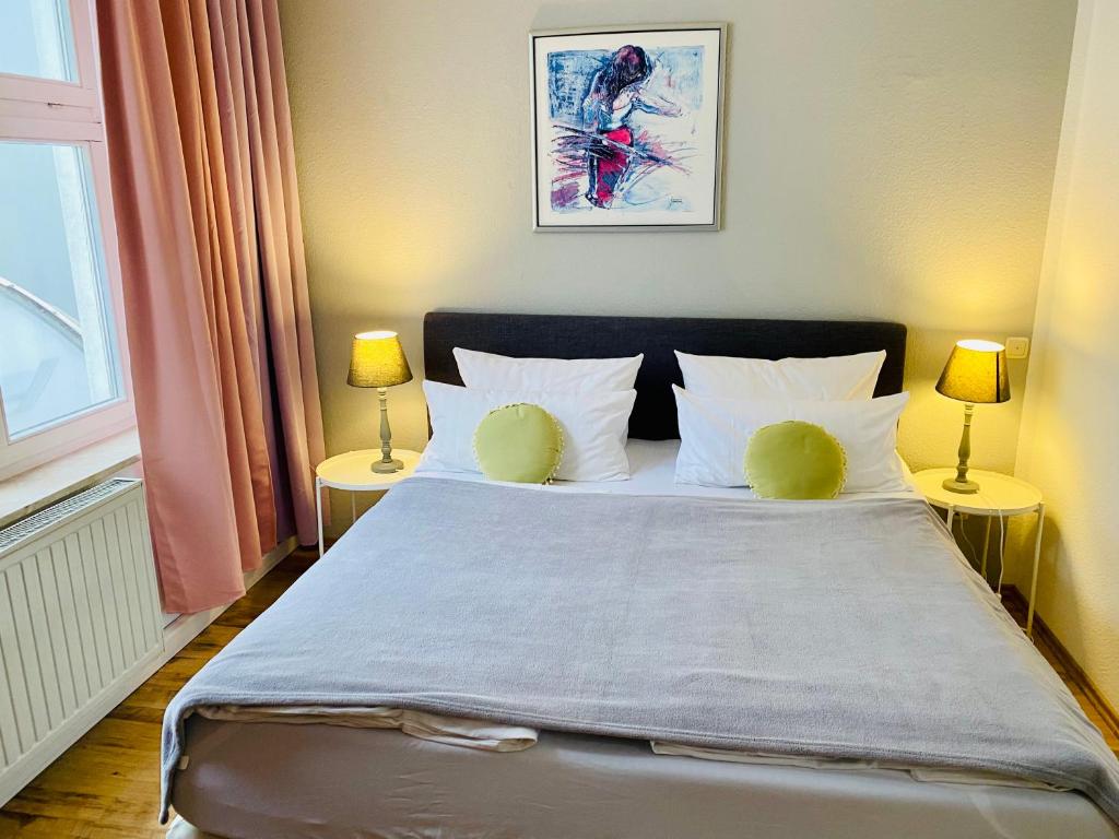 Letto o letti in una camera di Bärliner Hotel