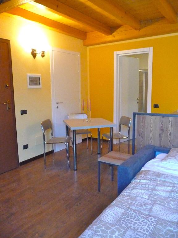 Postel nebo postele na pokoji v ubytování Tra Lago e Montagna Baita la Morena